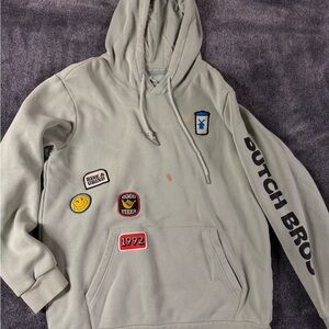 Light green dutch bros hoodie with patches